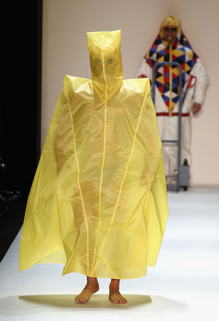 Illustration for article titled Scary Card-Playing Clowns, Lady Gaga Monsters, And Saran-Wrap Savages: Has Fashion Gone Insane?